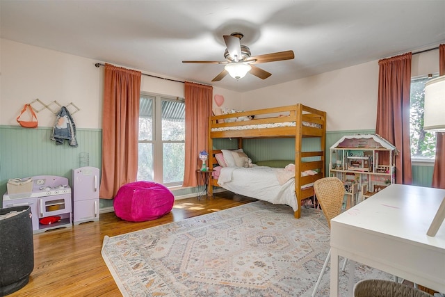 bedroom featuring hardwood / wood-style floors and ceiling fan