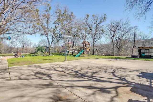 view of patio with a playground and basketball court