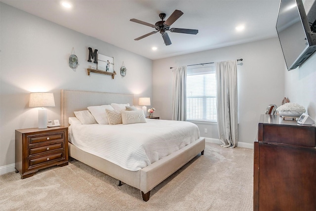 carpeted bedroom with ceiling fan