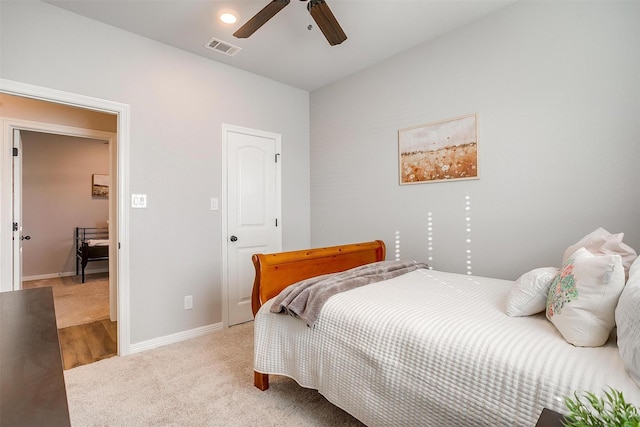 carpeted bedroom featuring ceiling fan