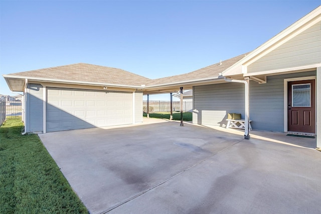 garage featuring a yard