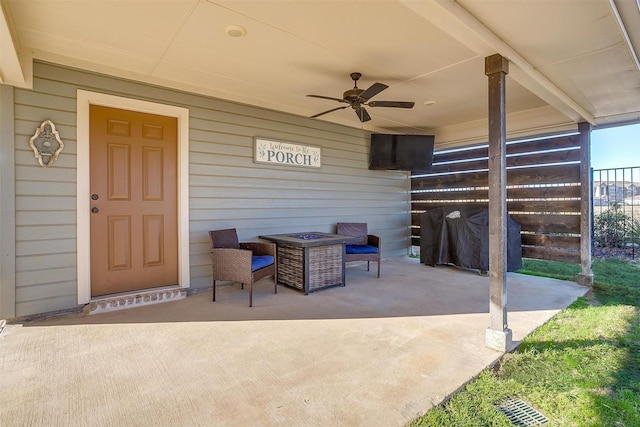 view of patio with ceiling fan