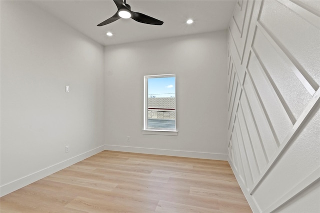 unfurnished room featuring ceiling fan and light wood-type flooring