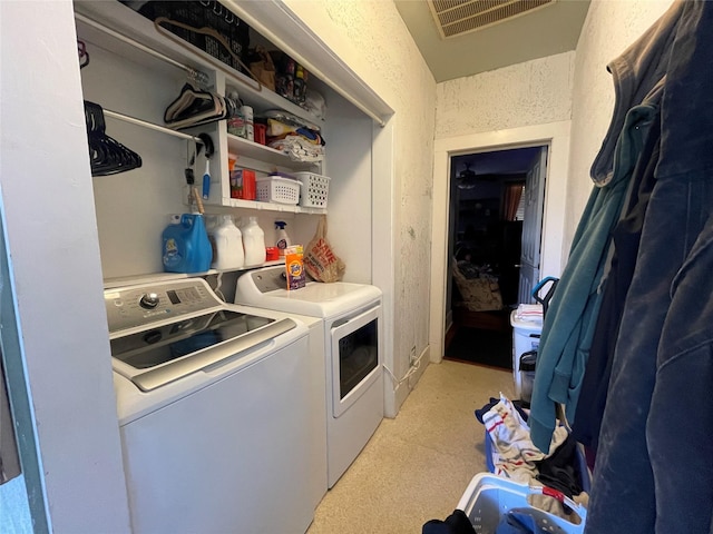 laundry room with independent washer and dryer