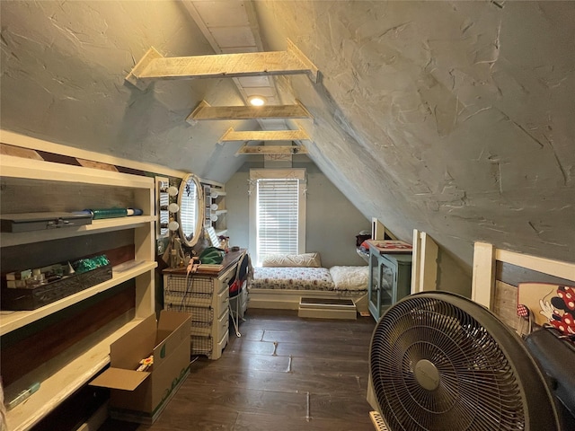 bedroom featuring dark hardwood / wood-style floors and vaulted ceiling