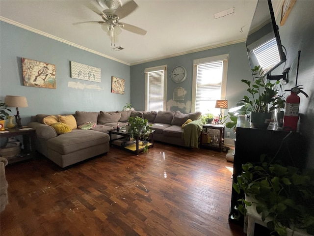 living room with dark hardwood / wood-style flooring, crown molding, and ceiling fan