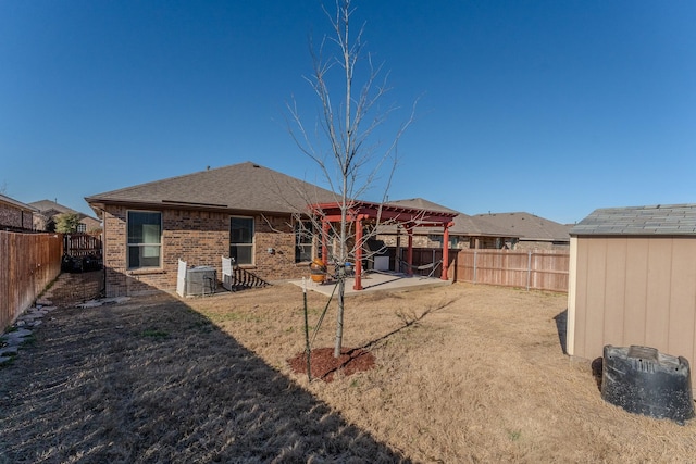 back of property with cooling unit and a patio