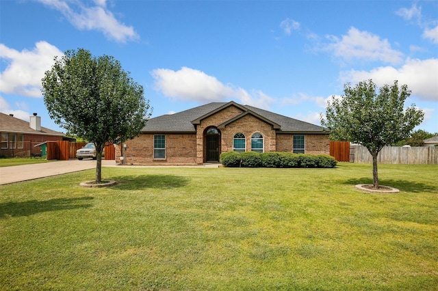 ranch-style house with a front lawn