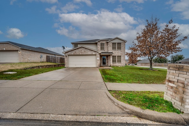 front of property featuring a garage and a front lawn