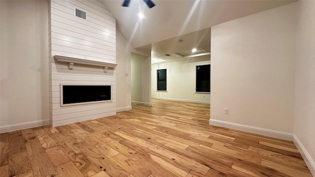 unfurnished living room featuring light hardwood / wood-style floors