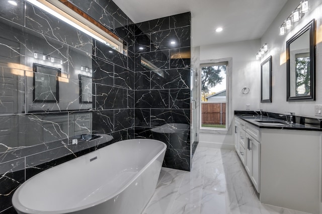 bathroom with vanity and a bathtub