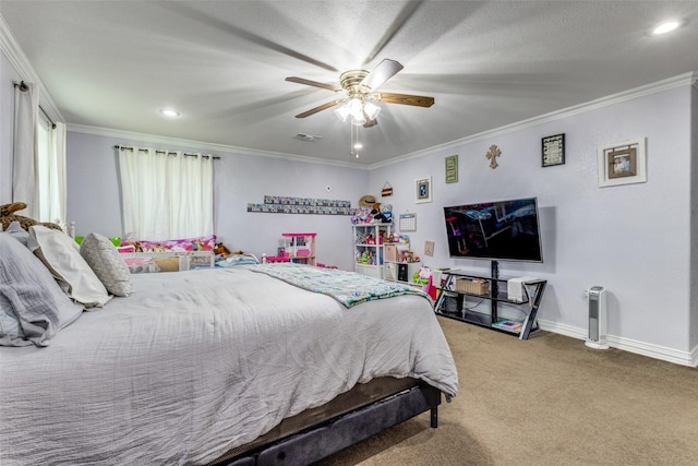 carpeted bedroom with ceiling fan and ornamental molding