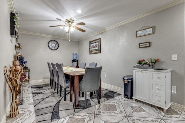 tiled dining space with ceiling fan and ornamental molding