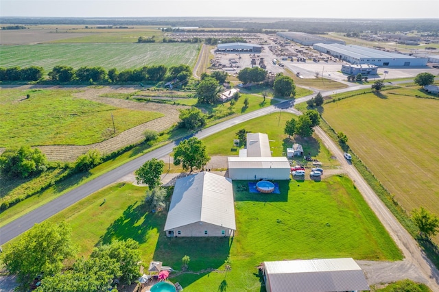 birds eye view of property featuring a rural view