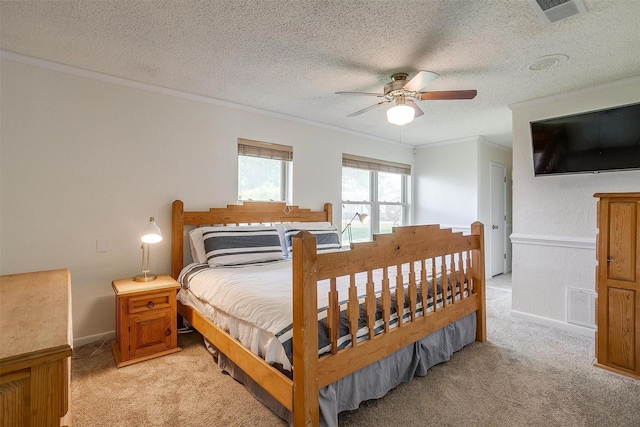 bedroom featuring light carpet, ornamental molding, and visible vents