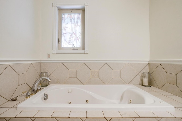 full bathroom with a jetted tub