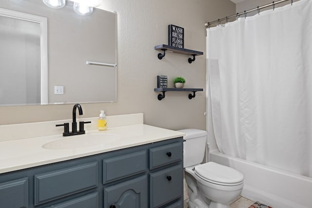 full bathroom with vanity, shower / tub combo with curtain, and toilet