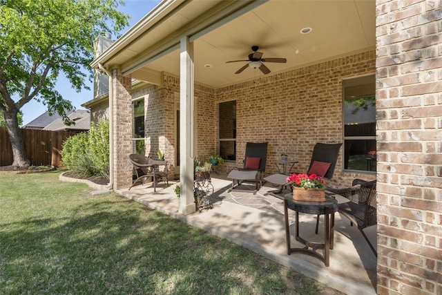 view of patio with ceiling fan