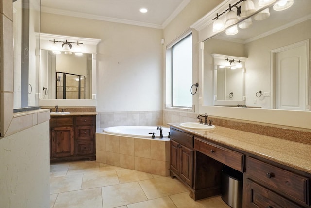 bathroom with tile patterned flooring, vanity, ornamental molding, and shower with separate bathtub