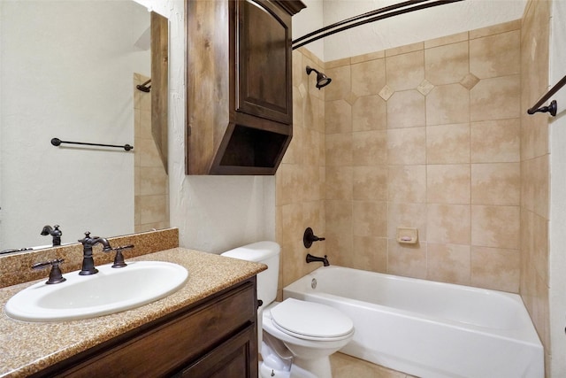 full bathroom featuring vanity, toilet, and tiled shower / bath