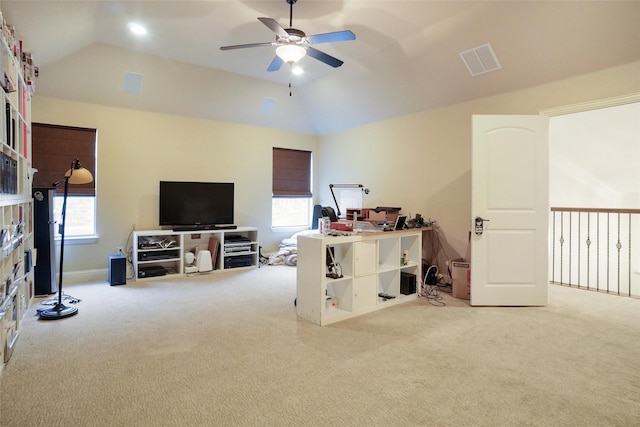 interior space with lofted ceiling, ceiling fan, and a healthy amount of sunlight