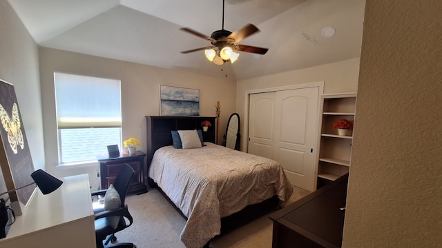 bedroom featuring light carpet, a closet, and ceiling fan