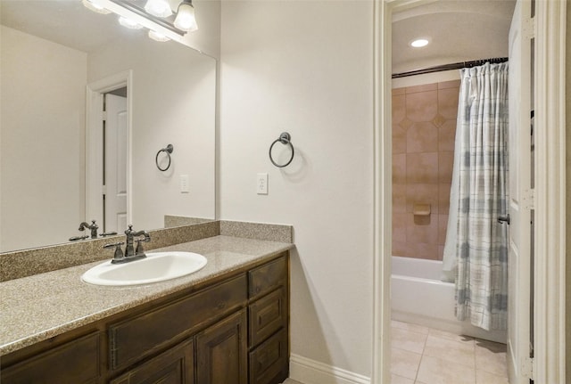 bathroom with tile patterned flooring, vanity, and shower / bath combo with shower curtain