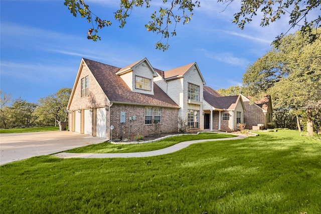 cape cod home featuring a garage and a front yard