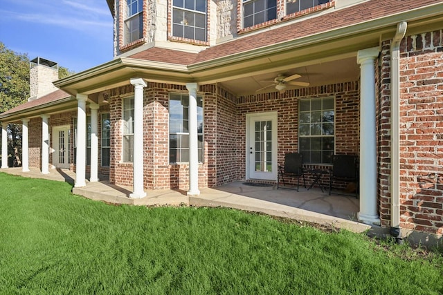 exterior space featuring ceiling fan