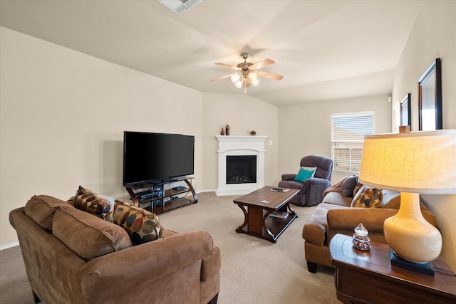 living room featuring carpet and ceiling fan