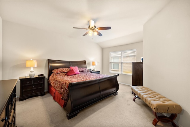 carpeted bedroom with lofted ceiling and ceiling fan