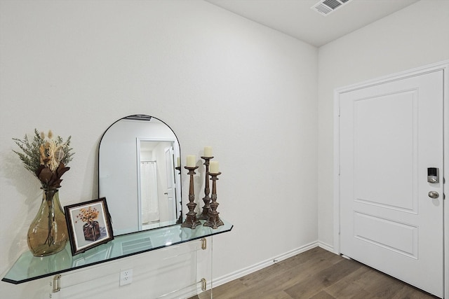 foyer featuring dark hardwood / wood-style floors