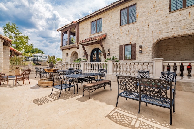 view of patio / terrace featuring a balcony