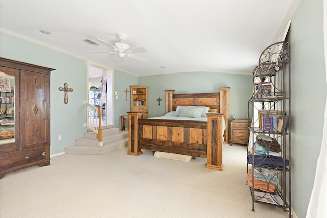 bedroom featuring light carpet, ceiling fan, and ornamental molding