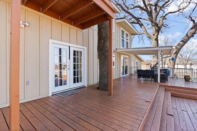 wooden terrace featuring french doors