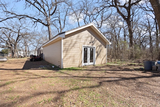 view of outbuilding with french doors