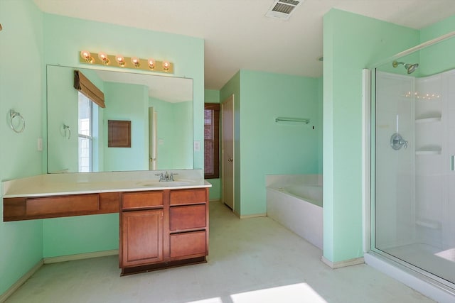 bathroom with shower with separate bathtub and vanity