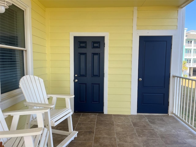 property entrance with a balcony