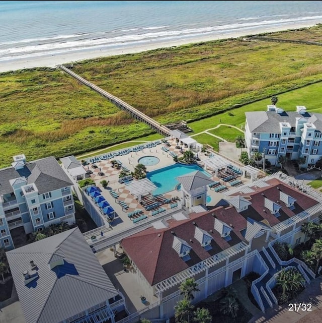 aerial view with a view of the beach and a water view