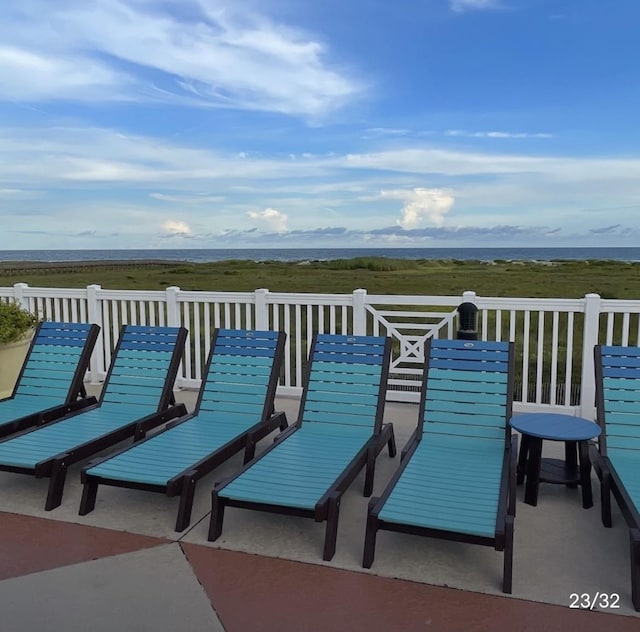 view of patio / terrace featuring a water view