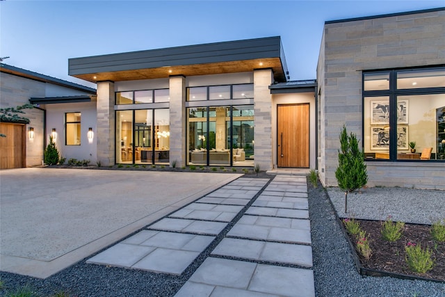 doorway to property featuring a patio area