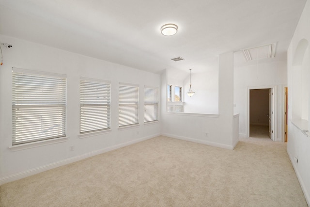 empty room featuring light colored carpet