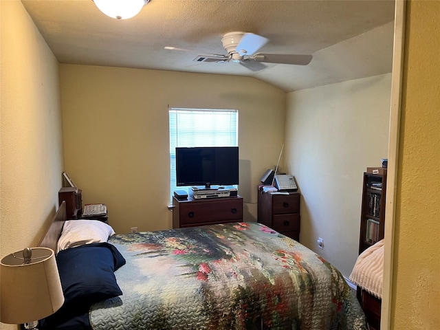 bedroom featuring vaulted ceiling and ceiling fan