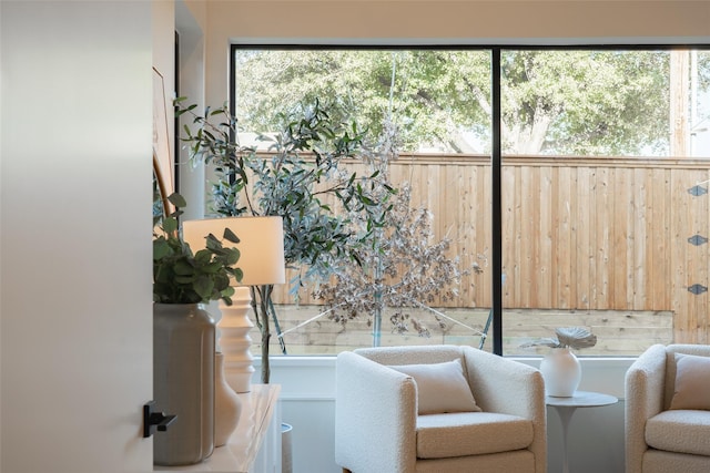 sitting room with a healthy amount of sunlight