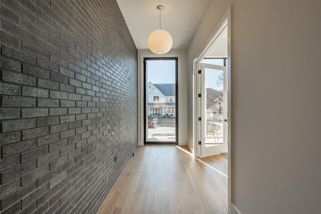 stairs featuring a towering ceiling and hardwood / wood-style floors