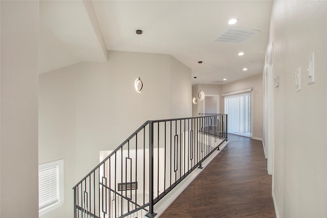 corridor featuring dark wood-type flooring