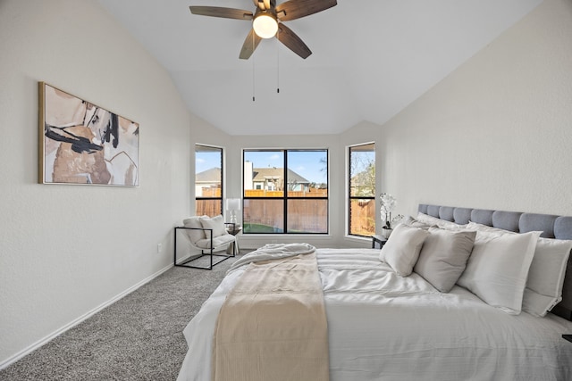 carpeted bedroom with lofted ceiling and ceiling fan