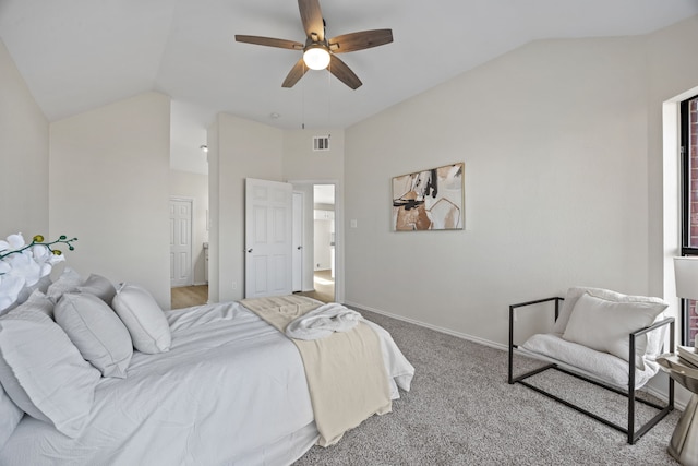 carpeted bedroom featuring vaulted ceiling and ceiling fan