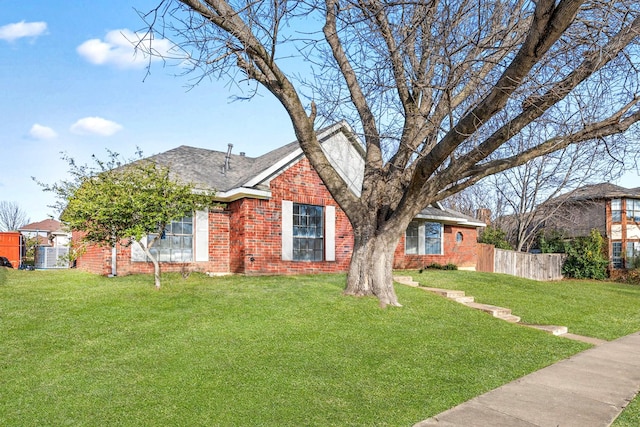 view of front of home with a front lawn