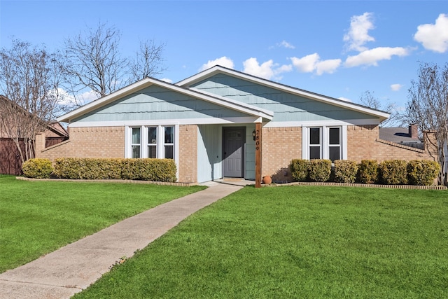 view of front of property with a front lawn